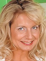 Dark haired cougar fucking a younger guy