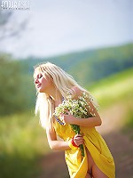 Teen strips outdoors