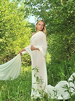 Adorable blonde with a perfect figure shows off her yummy tits and sweet pussy outdoors.