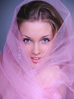 Sensuous images of a beautiful girl exposing her gorgeous naked body and nice shaven twat.