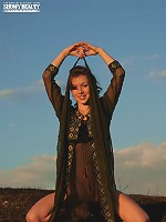 Hot babe enjoys posing and stripping outdoors and exposing her perfect tits and fine ass.