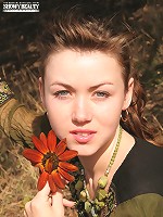 Hot babe enjoys posing and stripping outdoors and exposing her perfect tits and fine ass.