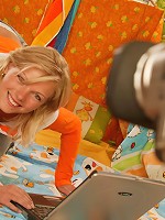 Stunning nympho fingers and dildo-fucks her juicy cunt in front of camera.