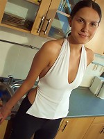 Teen babe is so horny she fingers herself on the kitchen counter.