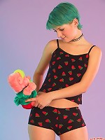 Fun girl with green hair shows off her world class ass.