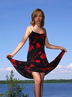 Sexpot teenager strips outside and finger fucks herself.