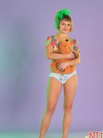 Limber teen babe in super cute panties does some gymnastics.