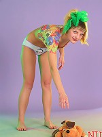 Limber teen babe in super cute panties does some gymnastics.