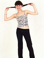 Petite chick shows off her curves and full bush.