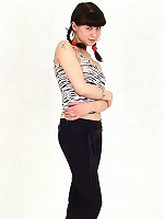 Petite chick shows off her curves and full bush.