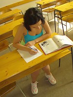 Dirty little student uses her dildo in her homeroom class.