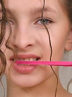 Lovely babe Viky is so playful today! She lowly gets rid of her clothes and reveals her smooth clit.