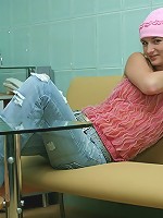 Sexy virgin Sarah takes off her clothes and spreads on a glassy table and on a yellow couch.