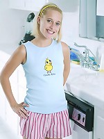 Cute blonde posing and flashing her tits