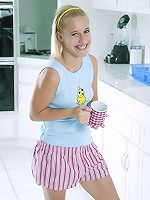 Cute blonde posing and flashing her tits