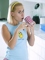 Cute blonde posing and flashing her tits