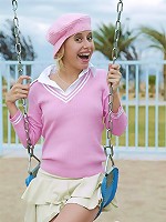 Softcore blonde giving a bit of up skirt show