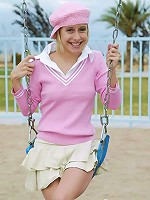 Softcore blonde giving a bit of up skirt show