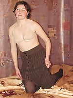 Mature Amateur Chick on Black Stockings Stripping