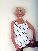 Horny mature woman with curly grey hair stripping off her clothes in this live solo clip