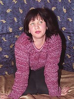 Mature redhead showing off her pussy and diddling with her cunt in front of the camera live