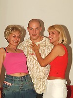 Naughty older women Rita and Rosalie enjoy taking turns in slurping and riding a dick live