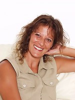 Nasty brunette matured whore gets kinky strips clothes then plays with her clit