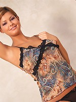 Tall babe strips out of her sexy panties