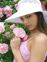 SweetEva posing nude in the garden