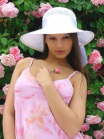 SweetEva posing nude in the garden