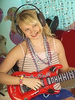 Sweet blonde chick flashes tasty pink pussy