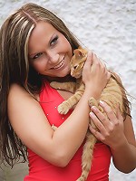 Stunning chick removes red dress and panties outdoors