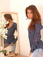 Sweet brunette poses naked in mirror