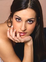 Long Legged brunette posing naked and gracefully