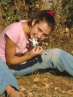 Cute Russian teen gets horny with some cream