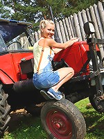 18yo Pinky June undressing on the top of the tractor!