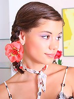 Pigtailed teen Caprice stripping and teasing