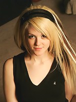 Cute 18 year old teases as she slowly strips