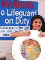 Jezebele flashes by the pool