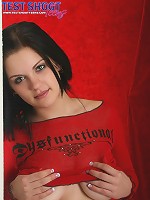 Sweet brunette teen shows off her big boobs in a red top