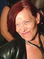 Red mature mama playing with her huge toy