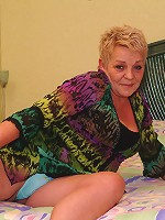 Kinky mature slut playing with a big toy