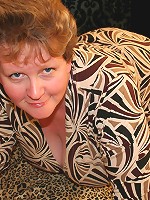 Huge breasted housewife playing with a toy