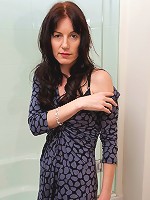 Horny mature slut playing with her dildo