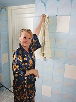 Horny mature slut playing alone in the bath and sauna