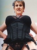 Horny big breasted mama playing with her toys