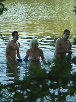 Mature slut fucking two dudes in the woods