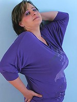 Huge breasted mature slut showing all