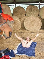 This horny mama gets nasty in the stable