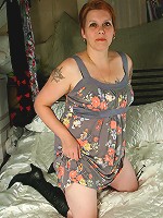 Naughty housewife playing with her pussy